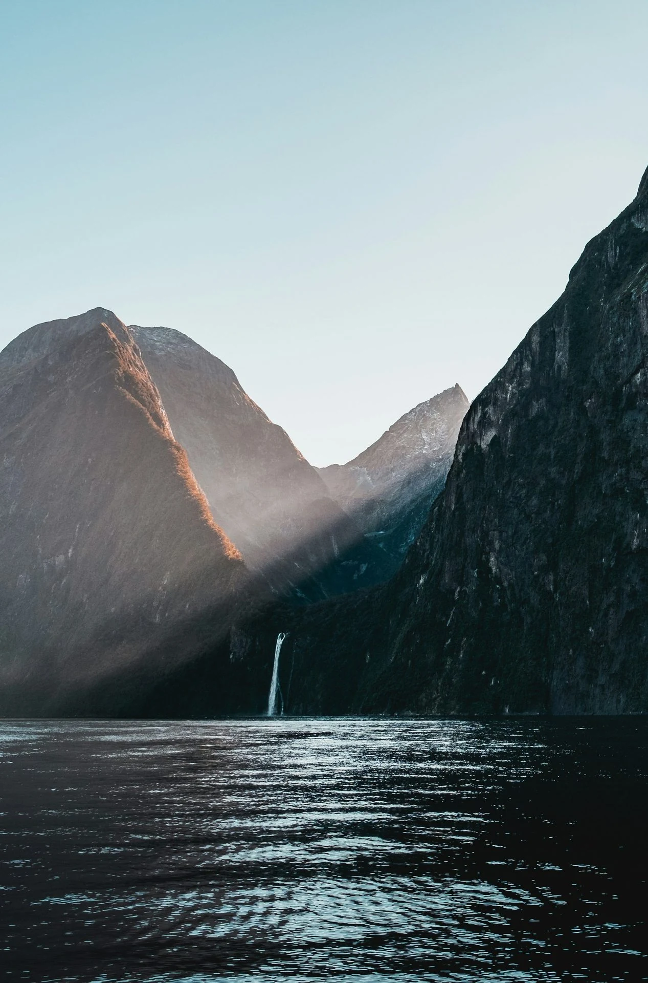 Milford Sound water and steep fiord walls